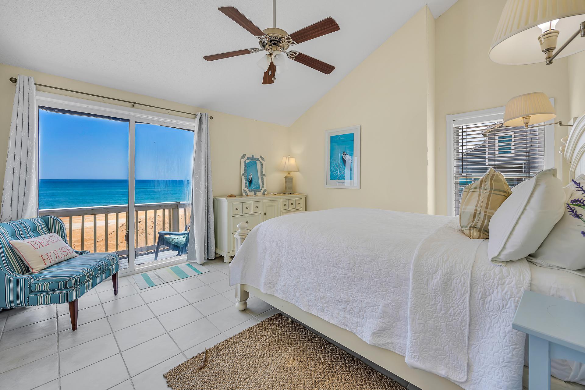 queen bedroom w/ private balcony and ocean view